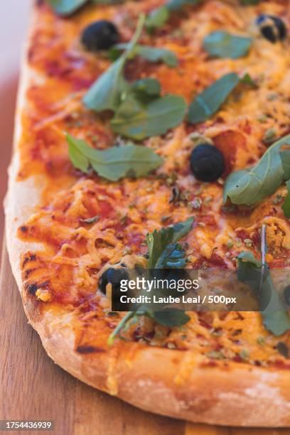 close-up of pizza on table - retos stock pictures, royalty-free photos & images
