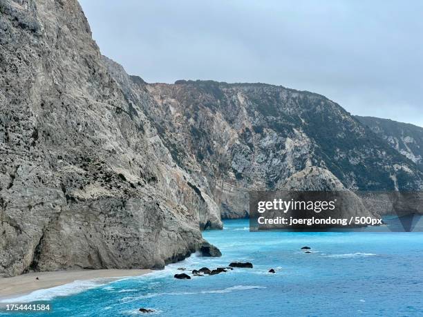 Ean Rocks Scenic View Of Sea And Rocks Against Sky High-Res Stock Photo - Getty ...