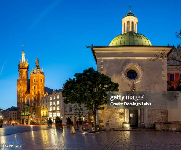 st. mary's basilica, church of st. wojciech, krakow, poland - town hall tower stock pictures, royalty-free photos & images