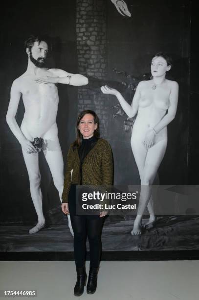 Claire Tabouret poses in front of the Work Man Ray - Cine-Sktech : Adam, Eve , 1924 during the Marcel Duchamp, La Peinture Même Exhibition Held at...