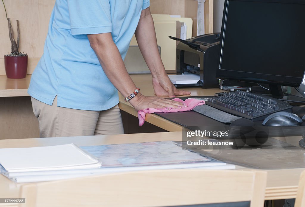 Woman Cleaning an Office