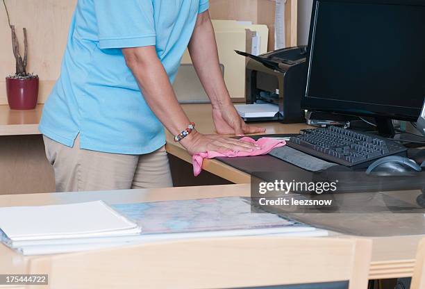 woman cleaning an office - office cleaning bildbanksfoton och bilder