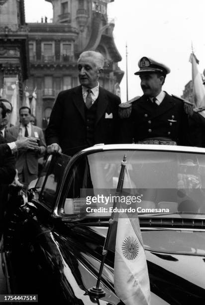 Arturo Umberto Illia after taking office as President of Argentina on October 12th, 1963. He is surrounded by Vice Admiral Eladio Vázquez in the...
