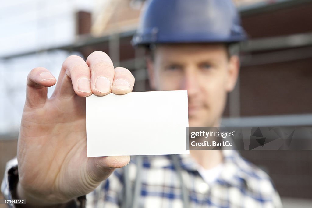 Worker Holding a Blank Business Card