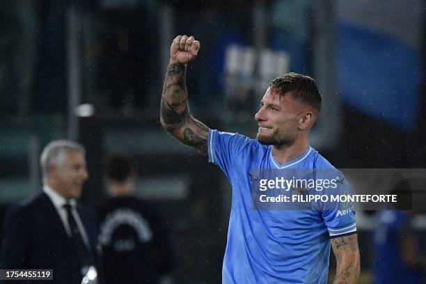 Lazio's Italian forward Ciro Immobile celebrates after scoring a penalty during the Italian Serie A football match between Lazio and Fiorentina at...