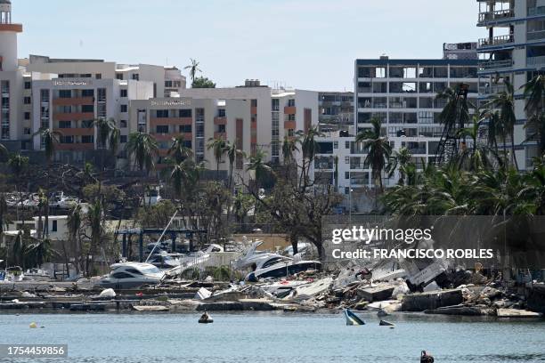 Stranded boats are seen on the beache after the passage of Hurricane Otis in the nautical area of Acapulco, Guerrero state, Mexico on October 30,...