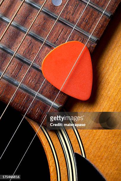 acoustic guitar with pick - musical instrument string stock pictures, royalty-free photos & images