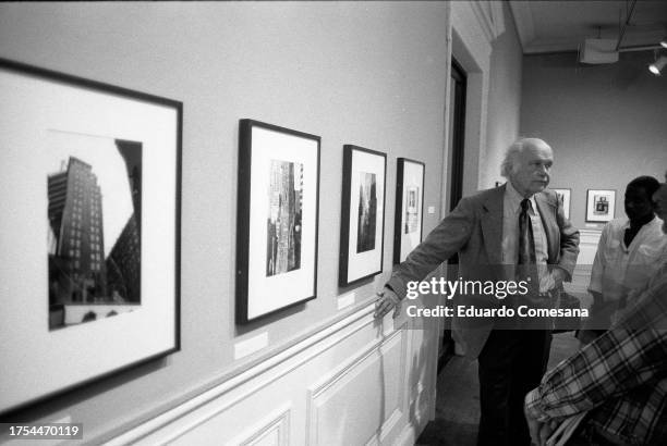 American curator and historian Beaumont Newall speaks during a workshop at the International Center of Photography , New York, New York, circa 1980.