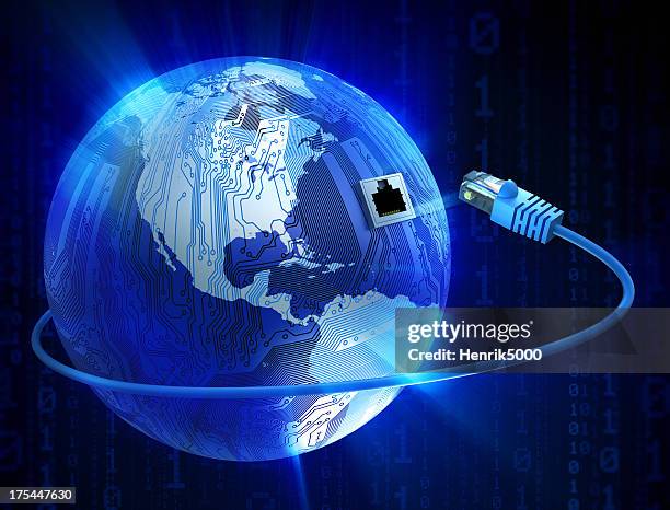 connected world concept: earth with circuits and ethernet cable - plugging in stockfoto's en -beelden