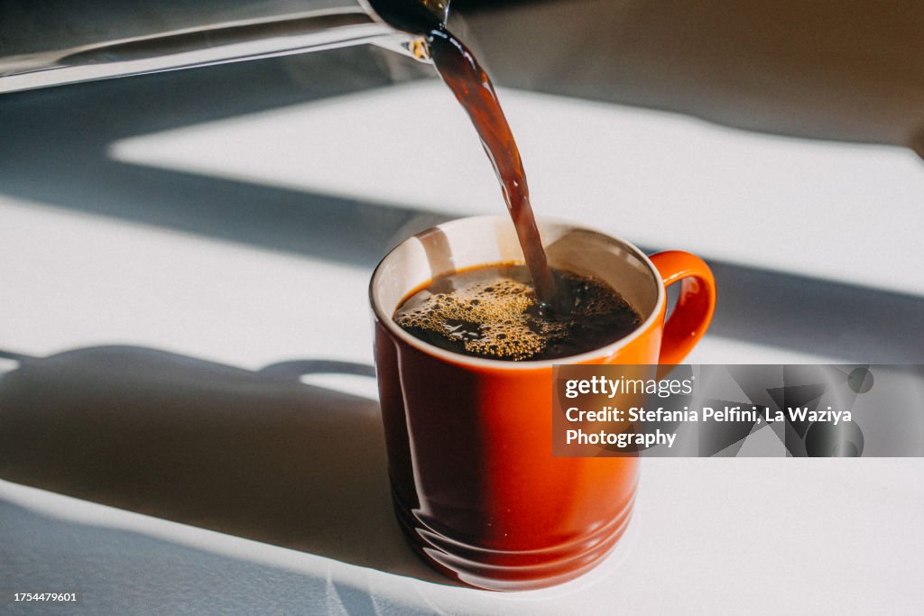 Coffee Pouring In Mug