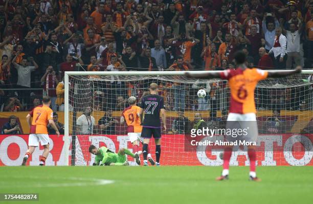 Mauro Icardi of Galatasaray scores the team's first goal from the penalty spot during the UEFA Champions League match between Galatasaray A.S. And FC...