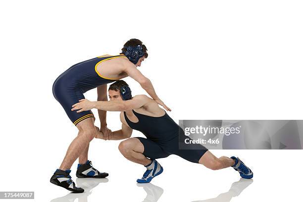 wrestlers in action - wrestling stock pictures, royalty-free photos & images
