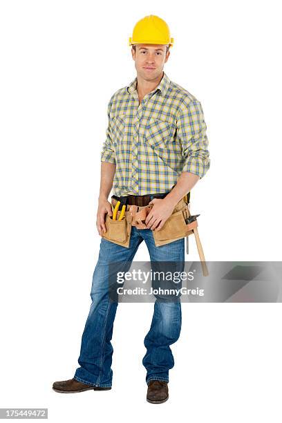 male carpenter wearing tool belt - builder standing isolated stock pictures, royalty-free photos & images