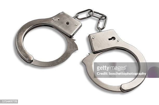 handschelle - handcuffs stock-fotos und bilder