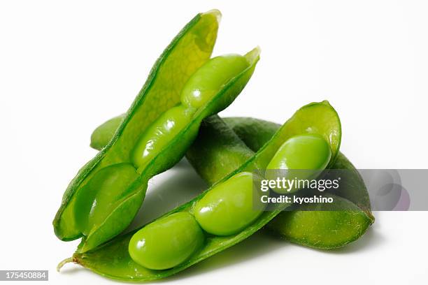 isolated shot of boiled soybeans on white background - bolster stockfoto's en -beelden