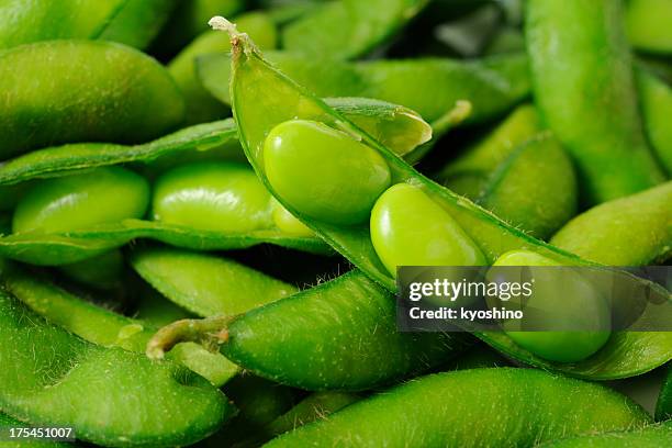 opened fresh boiled green soybeans - soya bean top view stock pictures, royalty-free photos & images
