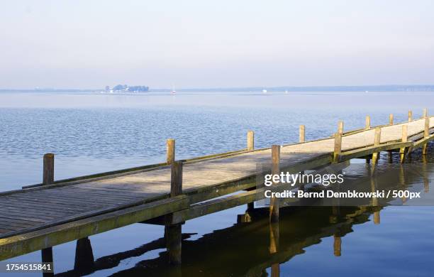 scenic view of sea against clear sky - bernd dembkowski stock-fotos und bilder