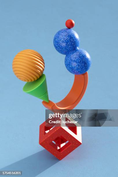 abstrakte 3d-komposition des ausbalancierens mehrfarbiger geometrischer formen - kegel stock-fotos und bilder