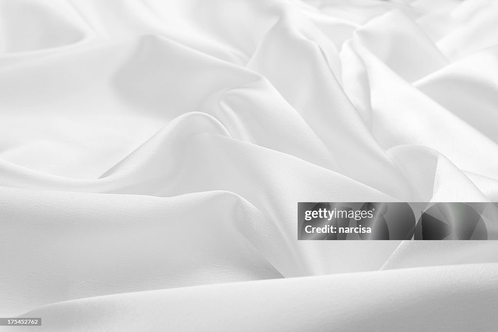 Delicate white satin silk background