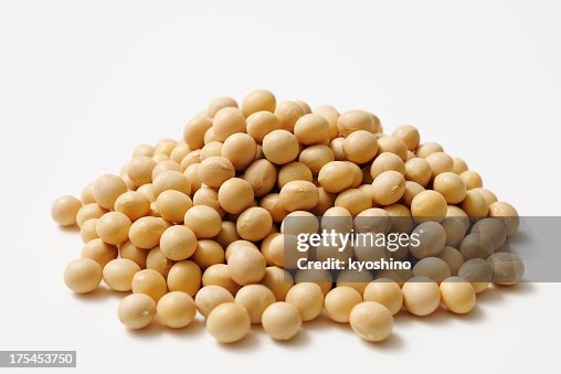 Isolated shot of stacked dried soybeans on white background Isolated shot of stacked dried soybeans on white background