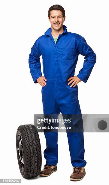 car mechanic and spare tyre - isolated - bib overalls 個照片及圖片檔