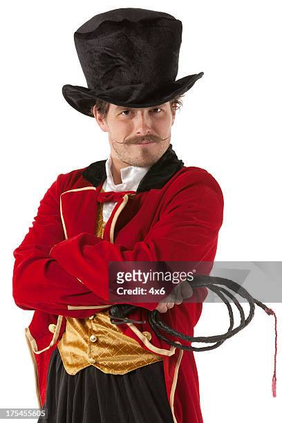 ring master standing with his arms crossed - ringmaster stock pictures, royalty-free photos & images