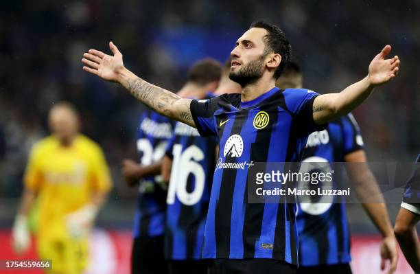 Hakan Calhanoglu of FC Internazionale celebrates after scoring the team's second goal from the penalty spot during the UEFA Champions League match...