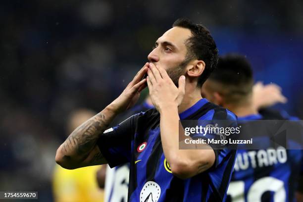 Hakan Calhanoglu of FC Internazionale celebrates after scoring the team's second goal from the penalty spot during the UEFA Champions League match...