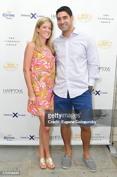 Alyssa Herman and Michael Daniels attend the Hamptons Magazine Celebrates With Cover Stars, Jonathan Adler And Simon Doonan at Day Lily Estate on...