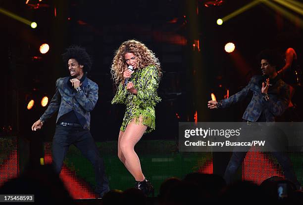 Entertainer Beyonce performs on stage during "The Mrs. Carter Show World Tour" at the Mohegan Sun Arena on August 2, 2013 in Uncasville, Connecticut....