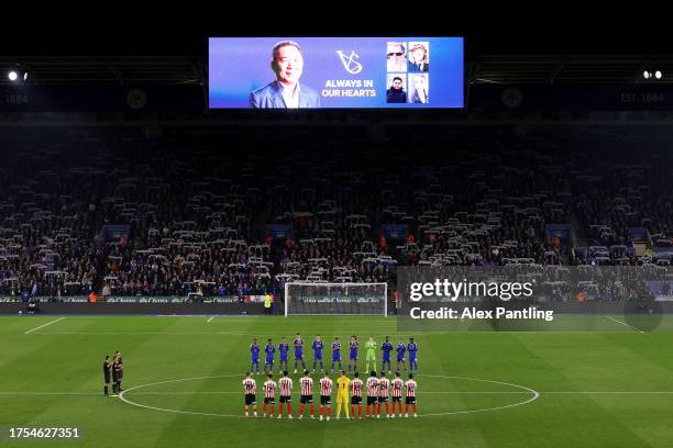 Players, officials and fans hold a minutes applause in memory of former Leicester City owner Vichai Srivaddhanaprabha prior to the Sky Bet...