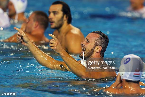 Marton Szivos of Hungary celebrates after victory in the Water Polo Men's Gold Medal Match between Hungary and Montenegro on day fifteen of the 15th...