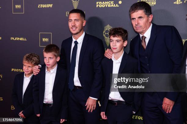 Former Belgian midfielder Eden Hazard and his father Thierry Hazard pose upon their arrival to attend the 2023 Ballon d'Or France Football award...