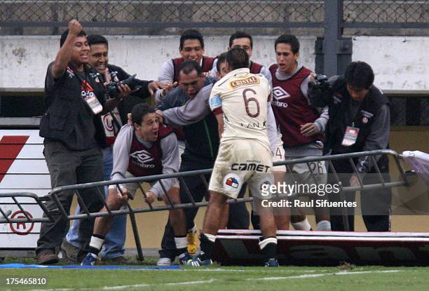Rainer Torres of Universitario celebrates a goal during a match between Universitario and Sporting Cristal as part of Torneo Descentralizado 2013 at...