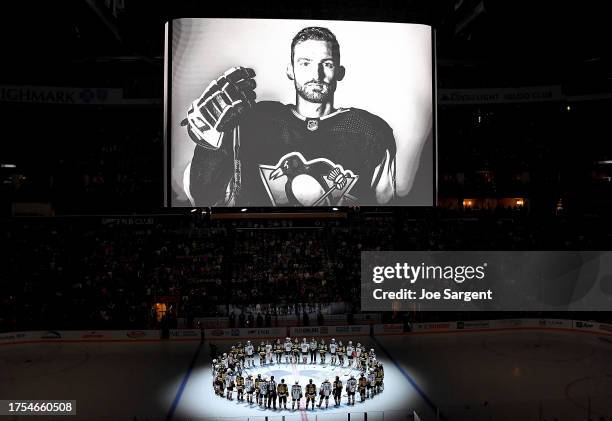 Adam Johnson is remembered before the game between the Pittsburgh Penguins and the Anaheim Ducks at PPG PAINTS Arena on October 30, 2023 in...