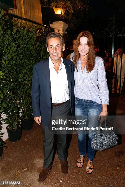 Former French President Nicolas Sarkozy and his wife singer Carla Bruni attend "Pianistic" Concert of singer Julien Clerc at at 29th Ramatuelle...