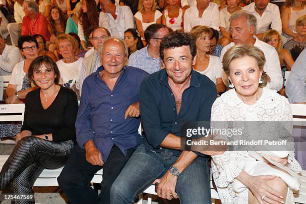 Marc Ladreit de Lacharriere and his wife, singer Patrick Bruel and Lily Safra attend "Pianistic" Concert of singer Julien Clerc at at 29th Ramatuelle...