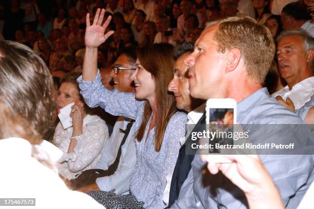 Former French President Nicolas Sarkozy and his wife singer Carla Bruni watching "Pianistic" Concert of singer Julien Clerc at at 29th Ramatuelle...