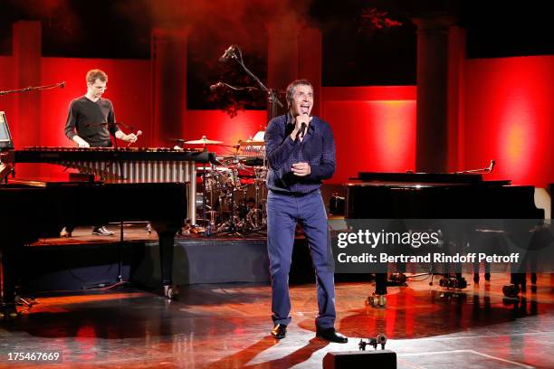 Musician Dominique Spagnolo and Singer Julien Clerc performs in his "Pianistic" Concert at 29th Ramatuelle Festival : Day 4 on August 3, 2013 in...