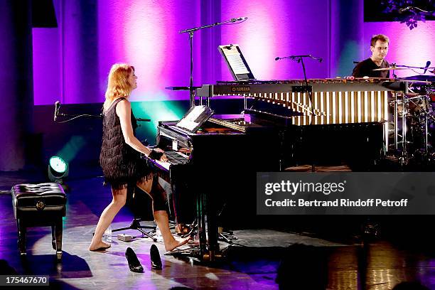 Pianist Aurore Crevelier and Musician Dominique Spagnolo perform at "Pianistic" Concert of singer Julien Clerc at at 29th Ramatuelle Festival : Day 4...