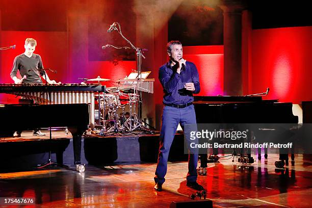 Musician Dominique Spagnolo and Singer Julien Clerc performs in his "Pianistic" Concert at 29th Ramatuelle Festival : Day 4 on August 3, 2013 in...