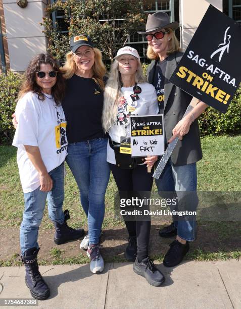 Laura San Giacomo, Mary McCormack, Frances Fisher and Allison Janney join the picket line outside Warner Bros. Studios on October 24, 2023 in...