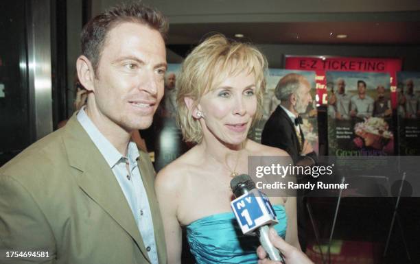 American film director Joel Hershman and English actress Trudie Styler are interviewed as they attend a screening of 'Greenfingers' at the Sony...