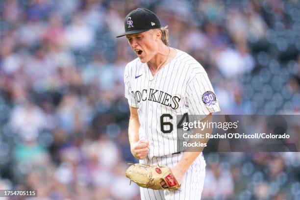 Gavin Hollowell of the Colorado Rockies reacts after striking out Jordan Luplow of the Minnesota Twins during the eleventh inning of a game at Coors...