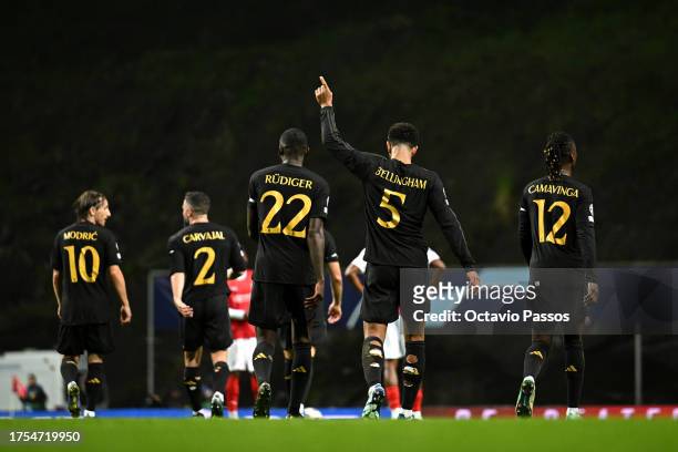 Jude Bellingham of Real Madrid celebrates after scoring the team's second goal during the UEFA Champions League match between SC Braga and Real...