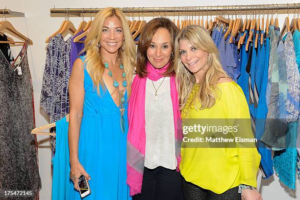 Designer Ramy Sharp and Good Day NY Anchor Rosanna Scotto attend Scoop Beach celebrates the Ramy Brook Collection on August 3, 2013 in East Hampton,...