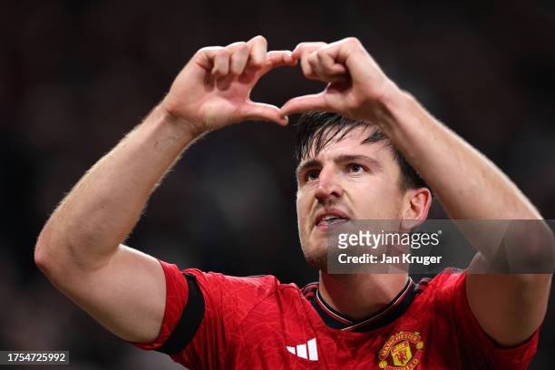 Harry Maguire of Manchester United celebrates after scoring the team's first goal during the UEFA Champions League match between Manchester United...