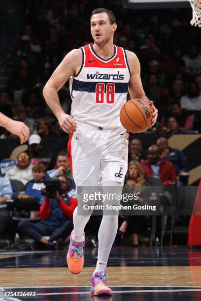 Danilo Gallinari of the Washington Wizards dribbles the ball during the game against the Boston Celtics on October 30, 2023 at Capital One Arena in...