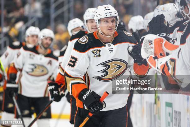 Jakob Silfverberg of the Anaheim Ducks celebrates with teammates after scoring a goal against the Pittsburgh Penguins during the first period at PPG...