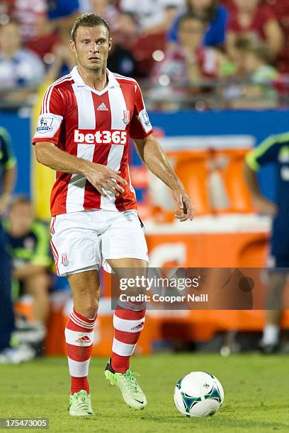 Erik Pieters of Stoke City brings the ball up field against FC Dallas on July 27, 2013 at FC Dallas Stadium in Frisco, Texas.